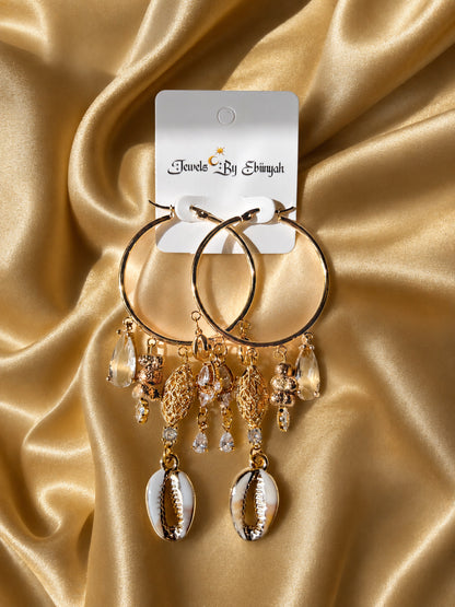 There she glows again earrings